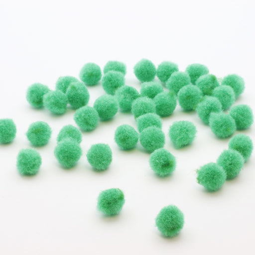 Kjøp grønne runde pomponger x40 i ull 10mm - Til å sy eller lime