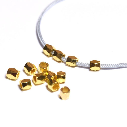 Kjøp X20 åttekantede perler metallisk messing - 3x2,5 mm forgylt - for armbåndskrage Bo